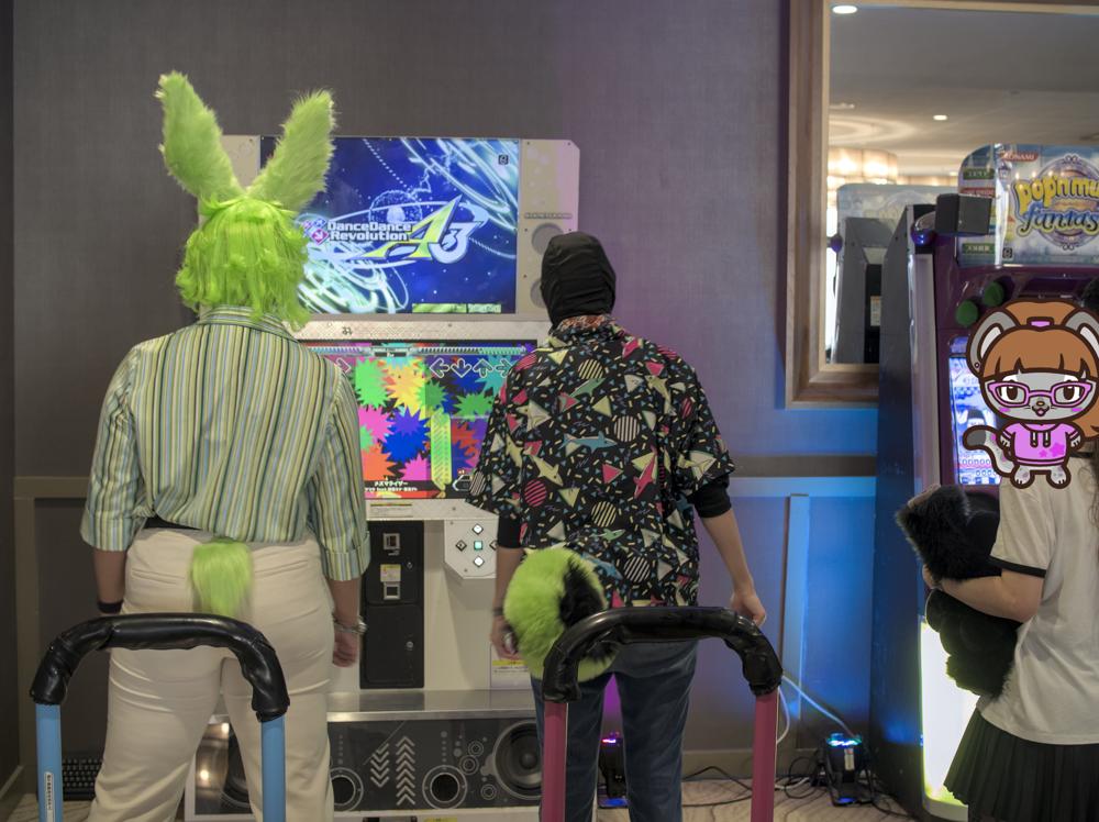 Xenia and another person playing DDR